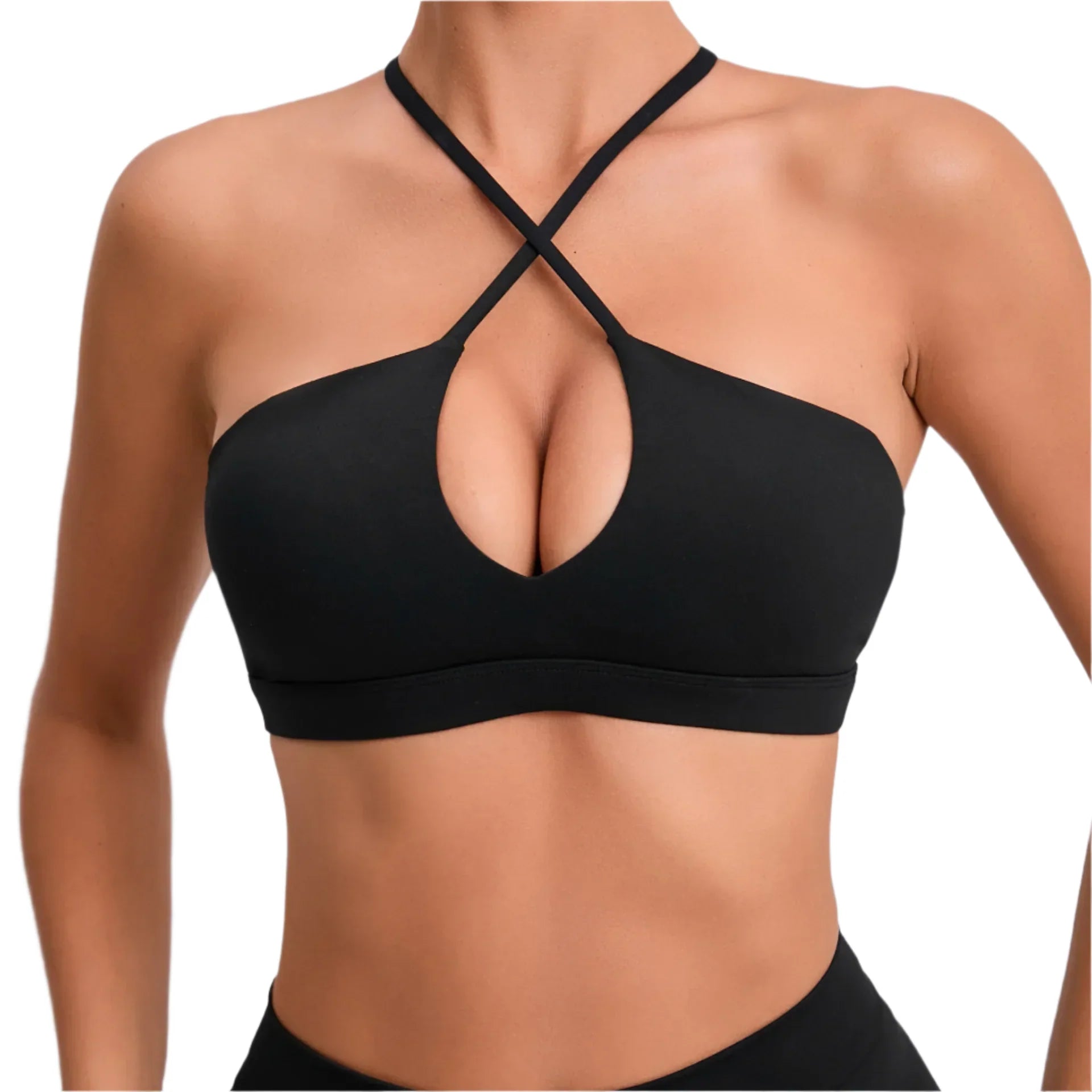 Black sports bra worn by a person on a light gray background
