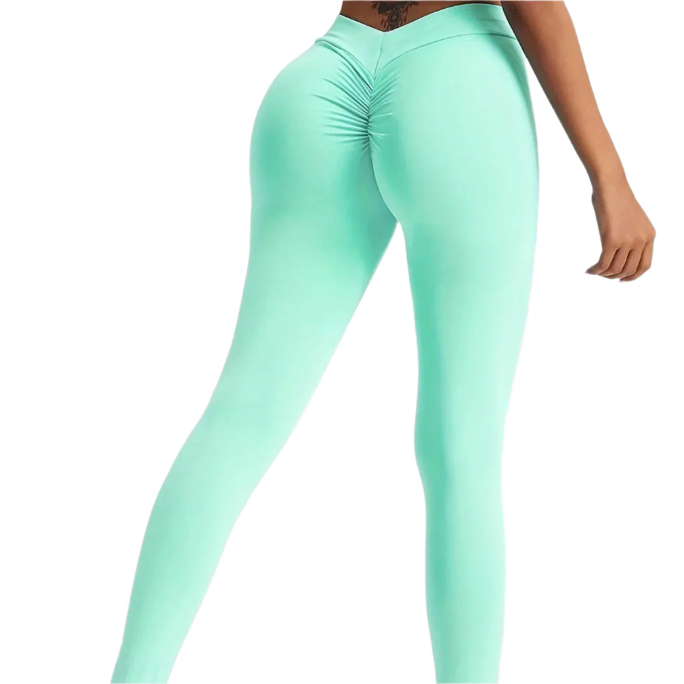 Mint green leggings worn by a person on a light gray background